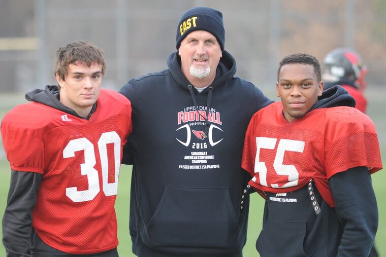 From left, Upper Dublin's Max Winebrake, head coach Bret Stover and Malik Bootman.