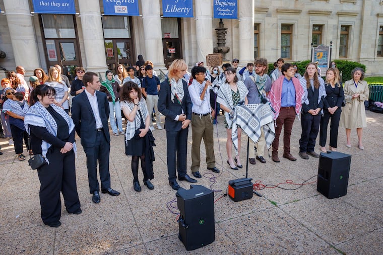 Members of the "Swarthmore 9," seen here at a news conference on June 9, are scheduled to go to trial next week in Media.