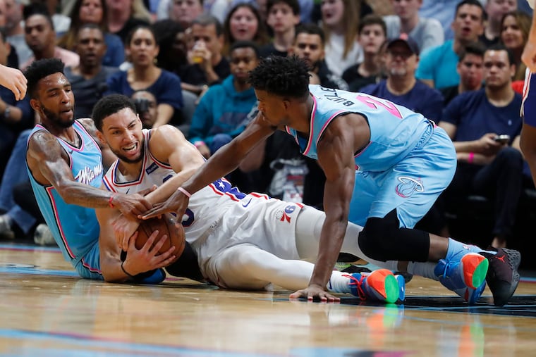 Sixers point guard Ben Simmons, center, says he and his teammates have to play with energy all the way through games.