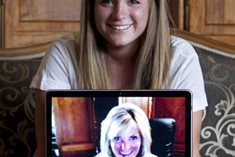 Away at school, Taylor Matichak uses Skype to stay in touch with her mother, Debbie Matichak. (David Pierini/Chicago Tribune)
