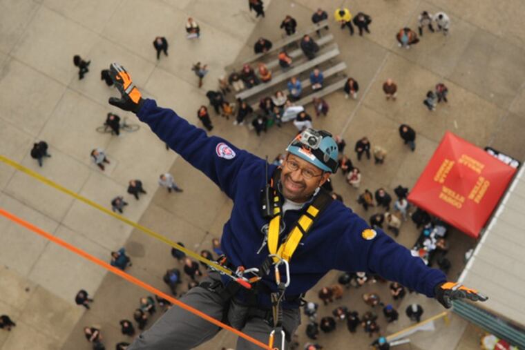 Mayor Michael Nutter rappels down the face of the 31-story One Logan Square skyscraper at last year's "BUILDING ADVENTURE."