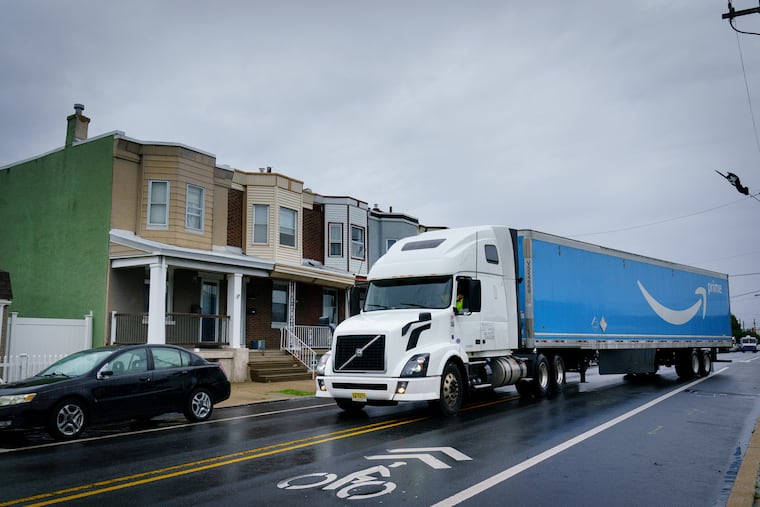 A truck from the Amazon Warehouse pulls onto the 4200 block of Richmond Street in Philadelphia.