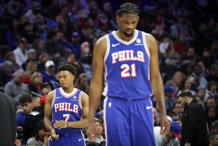 Sixers guard Kyle Lowry returns to the court behind teammate Joel Embiid against the Oklahoma City Thunder on Tuesday.