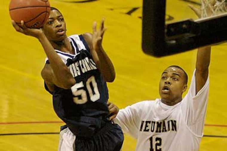 Amile Jefferson of Friends’ Central, going up for a basket against Neumann-Goretti, is one of the freshmen making an impact on the local high school basketball scene. (John Costello / Staff Photographer)