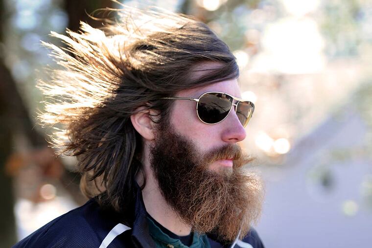 Andrew Morris runs near his West Deptford home. He just returned from Antarctica, where he won the 16th Antarctica Marathon. ( TOM GRALISH / Staff Photographer )