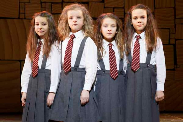This theater publicity image released by Boneau/Bryan-Brown shows the four actresses who share the title role in "Matilda The Musical," from left, Bailey Ryon, Milly Shapiro, Sophia Gennusa, and Oona Laurence on stage at the Shubert Theatre in New York. (AP Photo/Boneau/Bryan-Brown, Joan Marcus)