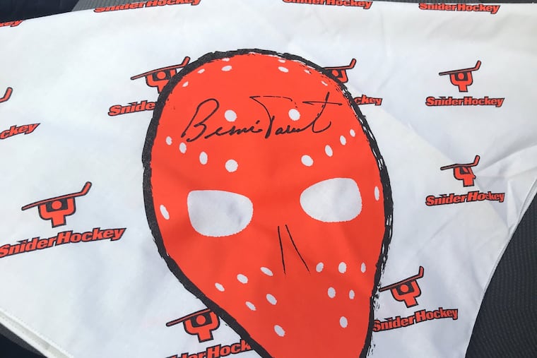 Flyers legend Bernie Parent and his wife, Gini, designed a bandanna/mask for people to wear during the coronavirus pandemic.