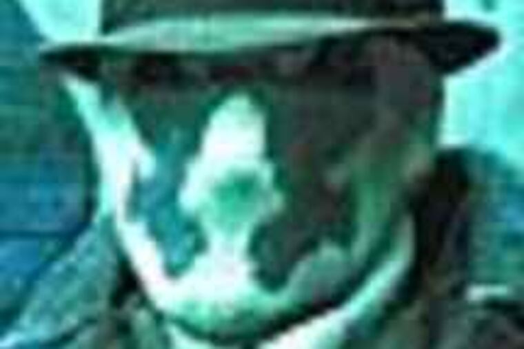 Haley, as Rorschach, in the movie.