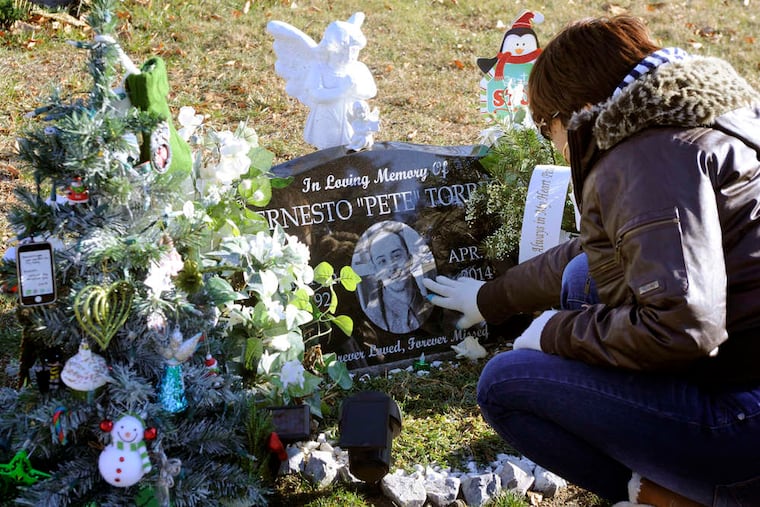 Since her son was killed in April, Cary Soldevila visits his grave every day at a cemetery in Pennsauken. Ernesto Torres, 22, was shot to death in Camden during a fight over a girl.