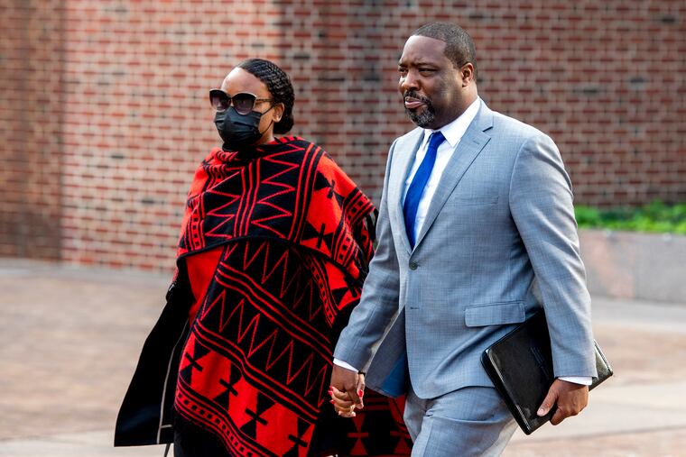 City Councilmember Kenyatta Johnson and his wife, Dawn Chavous, leaving the federal courthouse in Center City Philadelphia on Tuesday at the end of the first day of jury selection in their retrial on bribery charges.