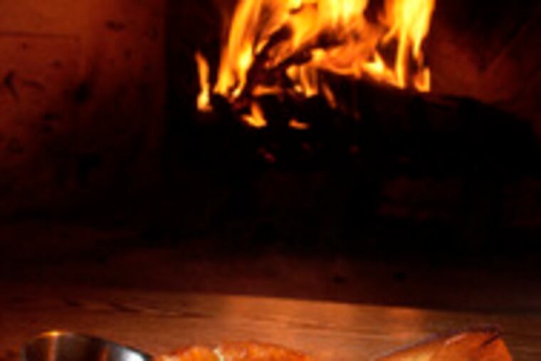 Toad in the Hole, sausages in Yorkshire pudding.