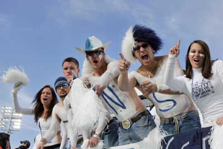 Penn State fans cheer before kickoff of their homecoming game against Michigan at Beaver Stadium on Saturday. (Barbara L. Johnston / Staff Photographer)