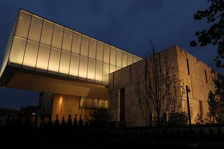 The cantilevered light box canopy of the Barnes Foundation building lights up the night on the Parkway (MICHAEL BRYANT / Staff Photographer )