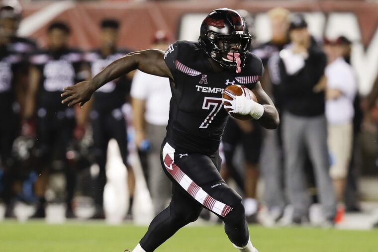 Temple Ryquell Armstead runs with the football against Tulsa on Thursday, September 20, 2018 in Philadelphia. YONG KIM / Staff Photographer