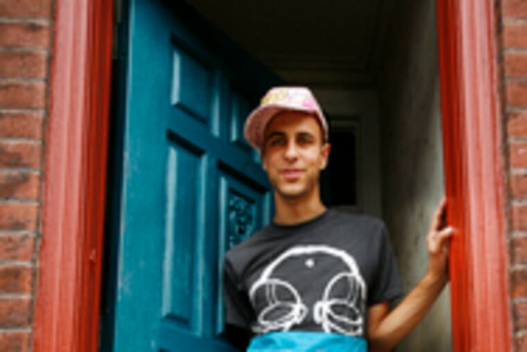 Fitzpatrick, in a shirt he designed, at his South Philly studio. He started by making skateboard apparel and says he aims to create "things pleasing to the eye and the soul - nothing tacky."