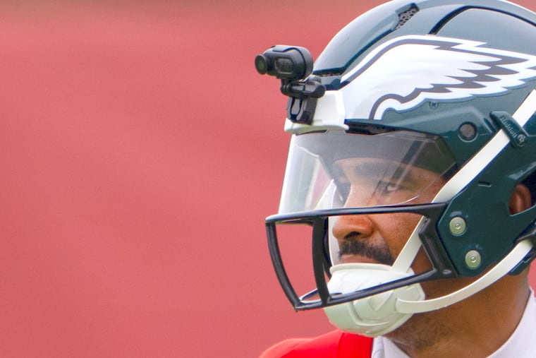 Eagles quarterback Jalen Hurts participates in training camp practice with a video camera mounted on his helmet at the Jefferson Health Training Complex.