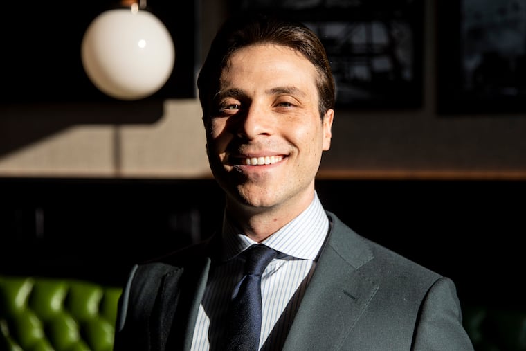 Josh Weinberg, 28, of Wynnewood, Pa., CEO of RABS (Run a Better Set), poses for a portrait at the Fitler Club in Philadelphia, Pa., on Thursday, Dec., 23, 2021. Weinberg’s business started back in March of 2018, where he provides studios that make movies and shows with an application that helps manage and onboard extras. “I imagined a solution and set out to built it,” Weinberg said. “I was a production assistant on a show and I had the idea and I saw the inefficiency.”