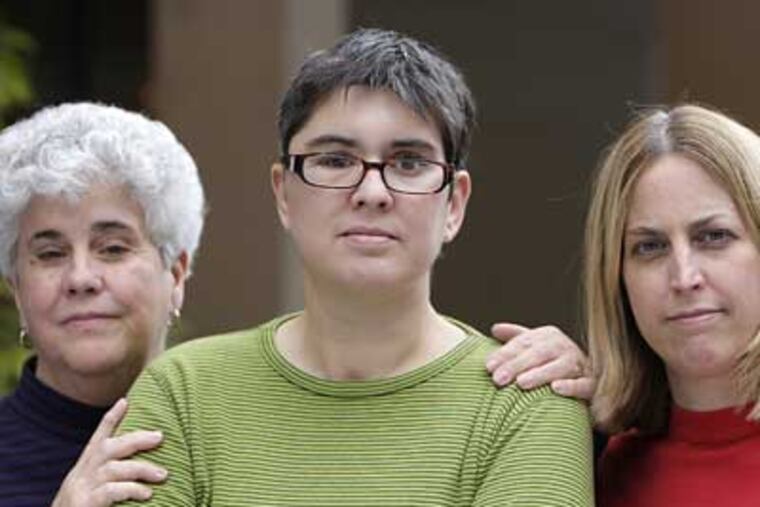 Cardinals fan Sandra Wacker (center); with her mother, Linda Wacker (left) and her sister, Jennifer Taylor; was hit by an drunk driver while in Philadelphia to attend a baseball game between the Phillies and the Cardinals earlier in the season. (David Maialetti / Staff Photographer)