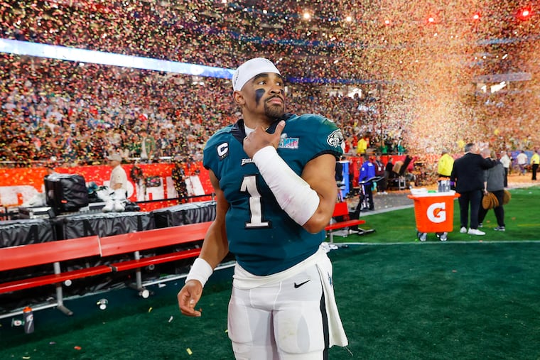 Eagles quarterback Jalen Hurts walks off the field after the loss to the Kansas City Chiefs in Super Bowl LVII.