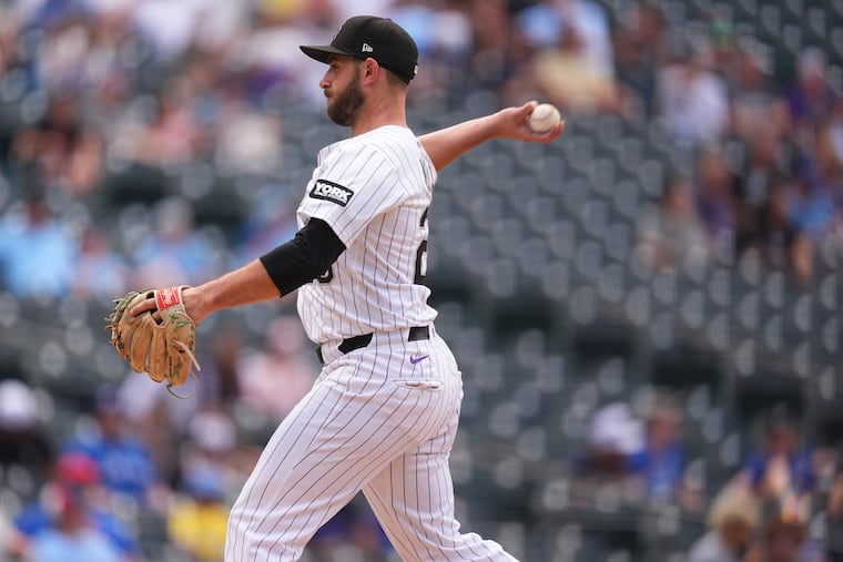 Colorado Rockies catcher Austin Nola filled in as a relief pitcher in the ninth inning of Wednesday's 20-1 loss to the Toronto Blue Jays.