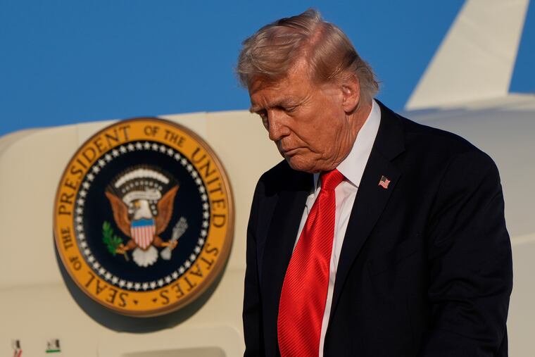 President Donald Trump arrives on Air Force One at LaGuardia Airport on Thursday, Sept. 11.
