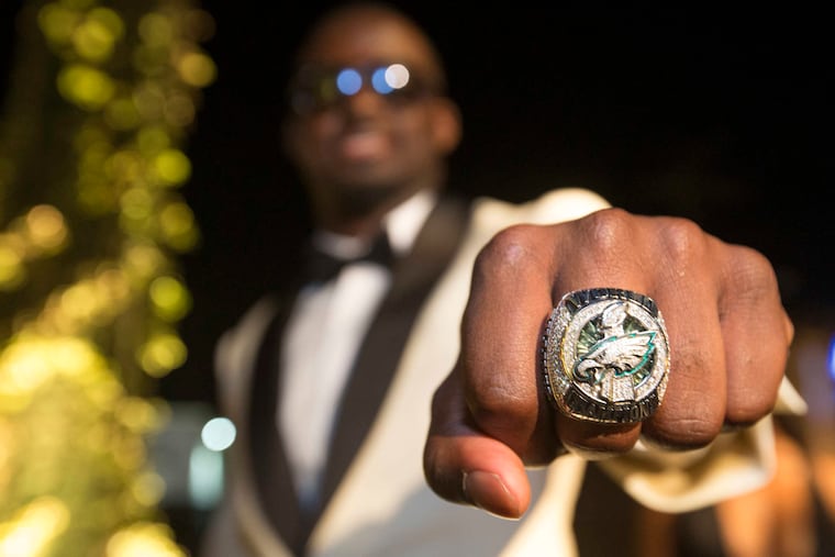 Former Eagles practice squad player DJ Killings
shows off his ring from Super Bowl LII.