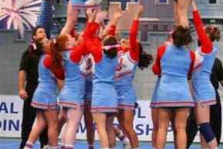 The Father Judge cheerleaders in action at the National High School Cheerleading Championship in Orlando, Fla.