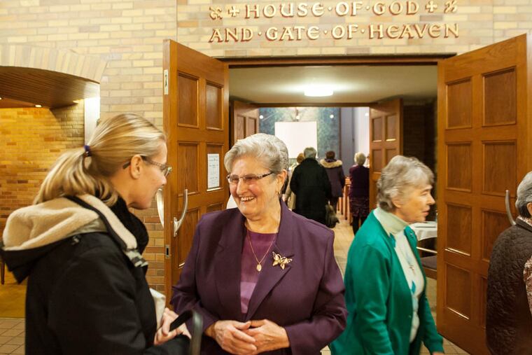 Sr. Jean Liston and Debbie Donofry catch up with each other before the start of the Advent Evening of Reflection service held at the Grey Nuns' national mottherhouse in Yardley. Sr. Liston delivered a message during the service. December 4, 2014, Yardley, Pennsylvania. ( Matthew Hall / Staff Photographer )