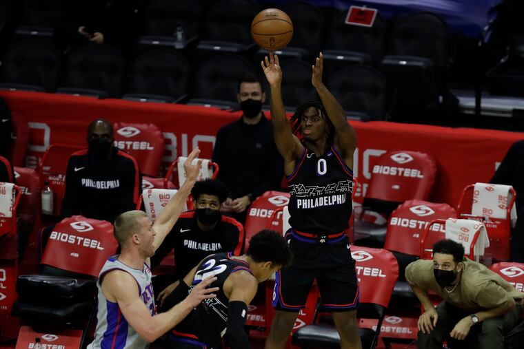 Sixers guard Tyrese Maxey, on his way to 22 points, shoots over the Detroit defense while teammate Matisse Thybulle sets a screen, on Saturday, May 8, 2021.