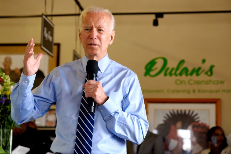 Democratic presidential candidate former Vice President Joe Biden, talks to community faith leaders during a 2019 visit to Dulan's soul food on Crenshaw in Los Angeles.