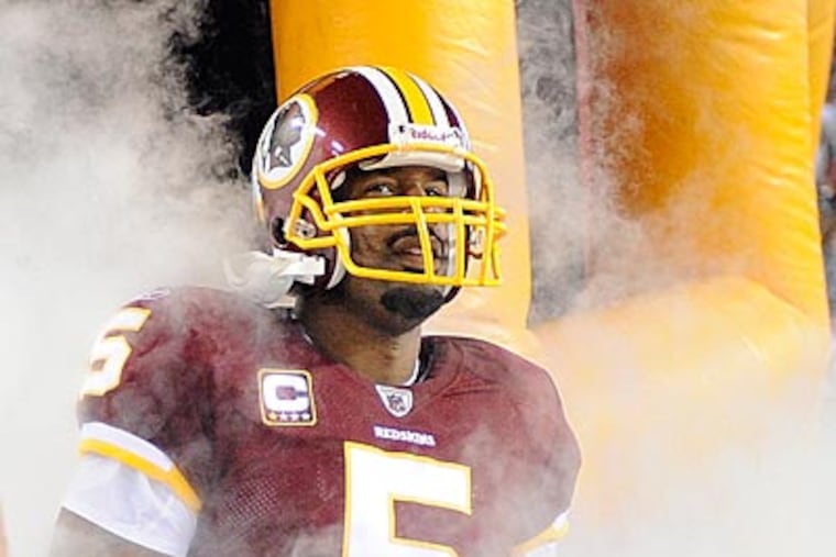 Donovan McNabb will walk out of the tunnel at Lincoln Financial Field for the first time as a visitor. (AP Photo/Nick Wass)