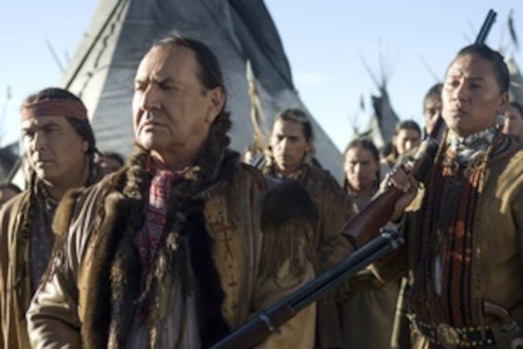 August Schellenberg, as Sitting Bull , with Eric Schweig (left) and Nathan Chasing Horse, in HBO's "Bury My Heart at Wounded Knee." The film narrows the scope of the classic book by Dee Brown and adds a love tale.