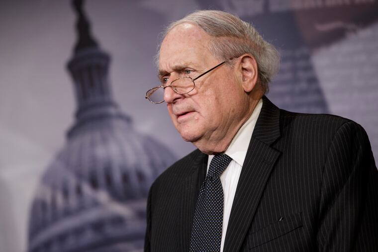 Former Michigan Sen. Carl Levin at a news conference in 2014.