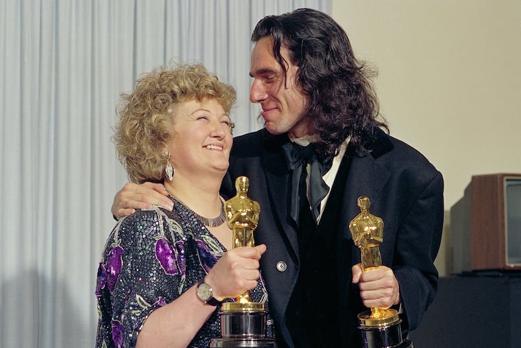 "My Left Foot" stars Brenda Fricker, winner of Oscar for best supporting actress, and Daniel Day Lewis, winner of Oscar for best actor, at the 62nd Annual Academy Awards in Los Angeles, March 26, 1990.