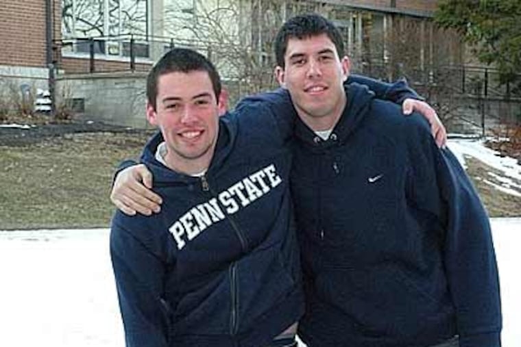 Brett Redmond, left, and his buddy Jake Arensen, right, at Penn State. Redmond dreamed of attending the University of Maryland, but when he did not get accepted, he went to Penn State, which he loves. (Jay Tracy)