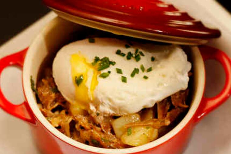 The duck confit hash at LoBianco New American Cuisine is topped off with a poached egg.