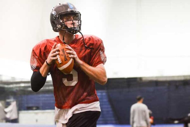 Philadelphia Soul quarterback Dan Raudabaugh drops back to pass during practice at the teams facilities in Voorhees, New Jersey on Thursday, July 31, 2014.