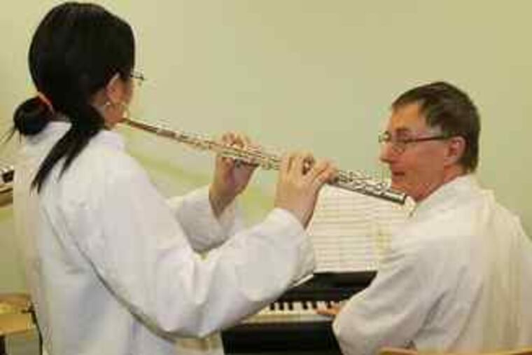 Paul J. Scaer, who also accompanied students on piano, joined the Science Leadership Academy after 17 years at Masterman.