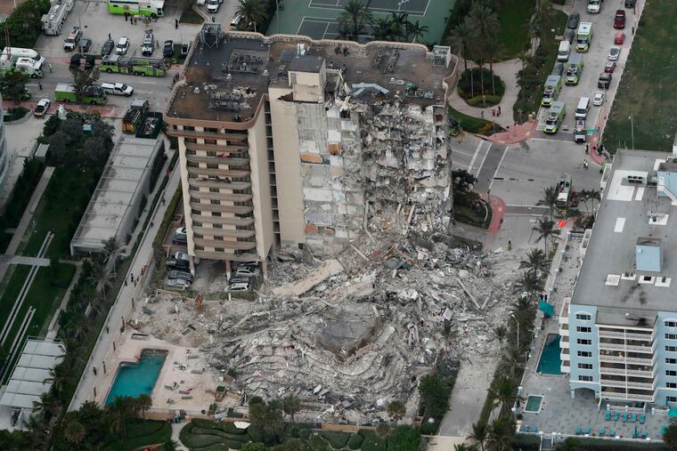 This aerial photo shows part of the 12-story oceanfront Champlain Towers South Condo that collapsed early Thursday.