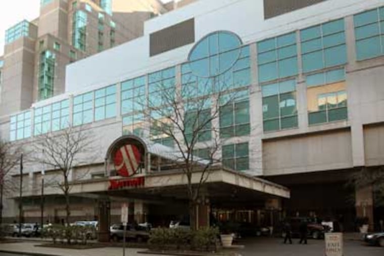 The Marriott Hotel in Center City. Unions, which have big annual conventions, aren't coming to Philadelphia because hotels such as the Marriott aren't unionized. (Laurence Kesterson / Staff Photographer)