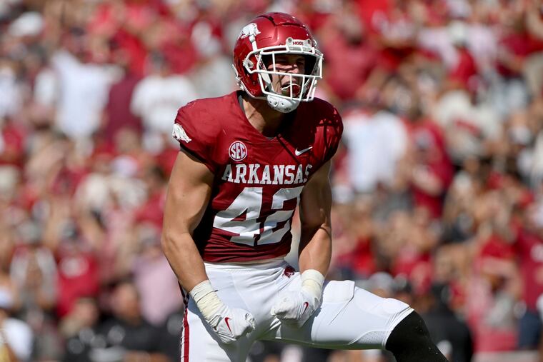 Arkansas linebacker Drew Sanders (42) celebrates after making a big play against Cincinnati during the first half of an NCAA college football game Saturday, Sept. 3, 2022, in Fayetteville, Ark. (AP Photo/Michael Woods)