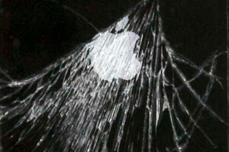 Cracked cellphones have become the equivalent of ripped jeans for the tech generation. (Washington Post)