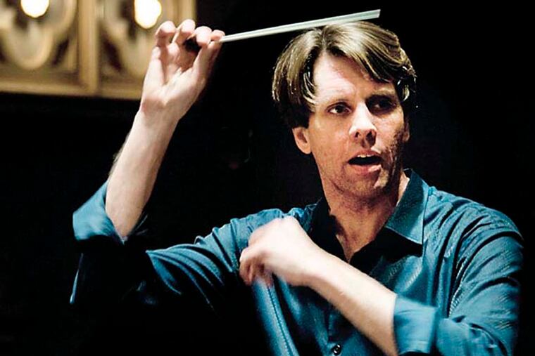 Michael Butterman, orchestra conductor, with the Boulder, Colo., Philharmonic. Photo by Glenn Ross.