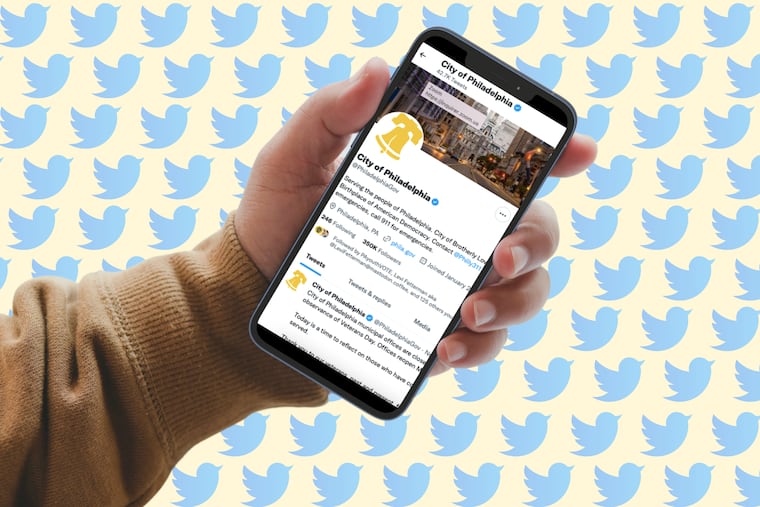 A photo illustration featuring the City of Philadelphia's Twitter account. Groups, including the city's communications department, are having discussions about how to proceed as Twitter changes.