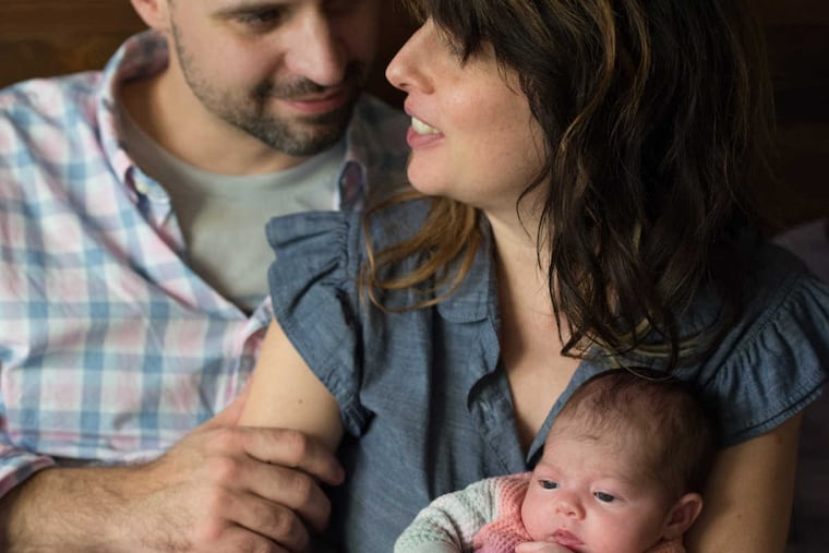 Caroline Ashurst, Bob Babjak and baby Mina.