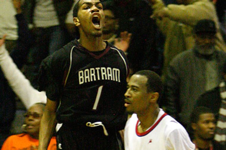 Bartram's Devin Moore celebrates in front of Frankford's Steffon Poole after it looked like they would win in regulation after his three point shot. (Ron Cortes / Staff Photographer)