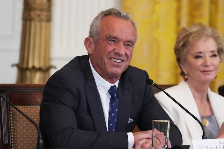 Health and Human Services Secretary Robert F. Kennedy Jr. and Education Secretary Linda McMahon attend a Make America Healthy Again (MAHA) Commission Event in the East Room of the White House on May 22.