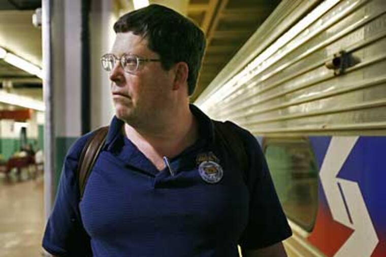 SEPTA engineer Tom Dorricott waits at Suburban Station to begin his shift aboard the R3 Media/Elwyn regional rail train. (Eric Mencher / Inquirer)