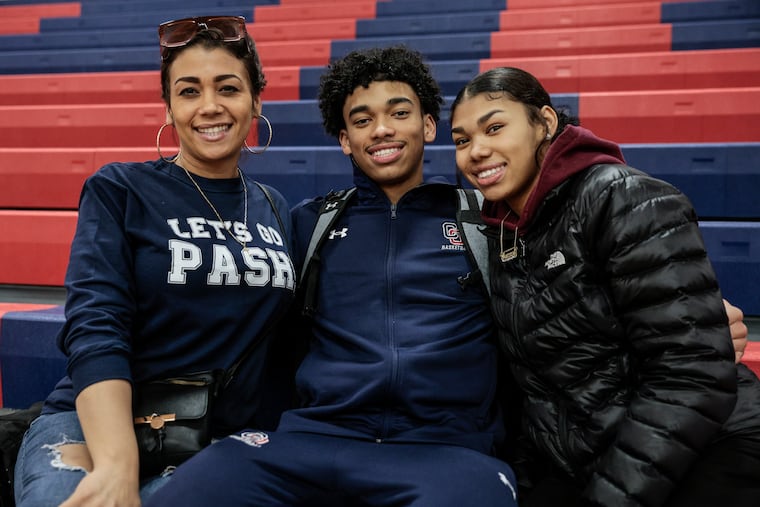 Cardinal O'Hara senior Izaiah Pasha, an Iona University recruit, with his mother, Melinda Laureano (left) and his sister Jazmine.