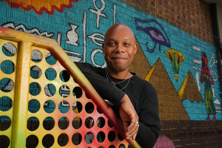 Tre Johnson outside the entrance to the former Fluid Nightclub in Philadelphia.